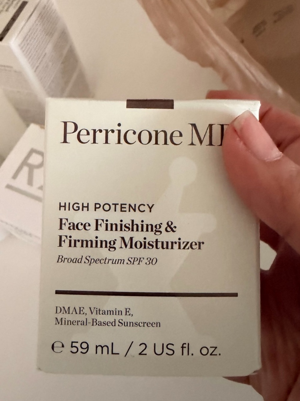 Perricone MD Face Finishing & Firming Moisturizer in mint green packaging
